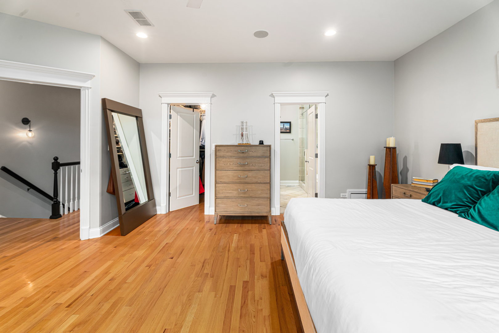 Undisclosed Address Chicago, IL 60613 - Photo 23 of 68 a room with a bed and a dresser