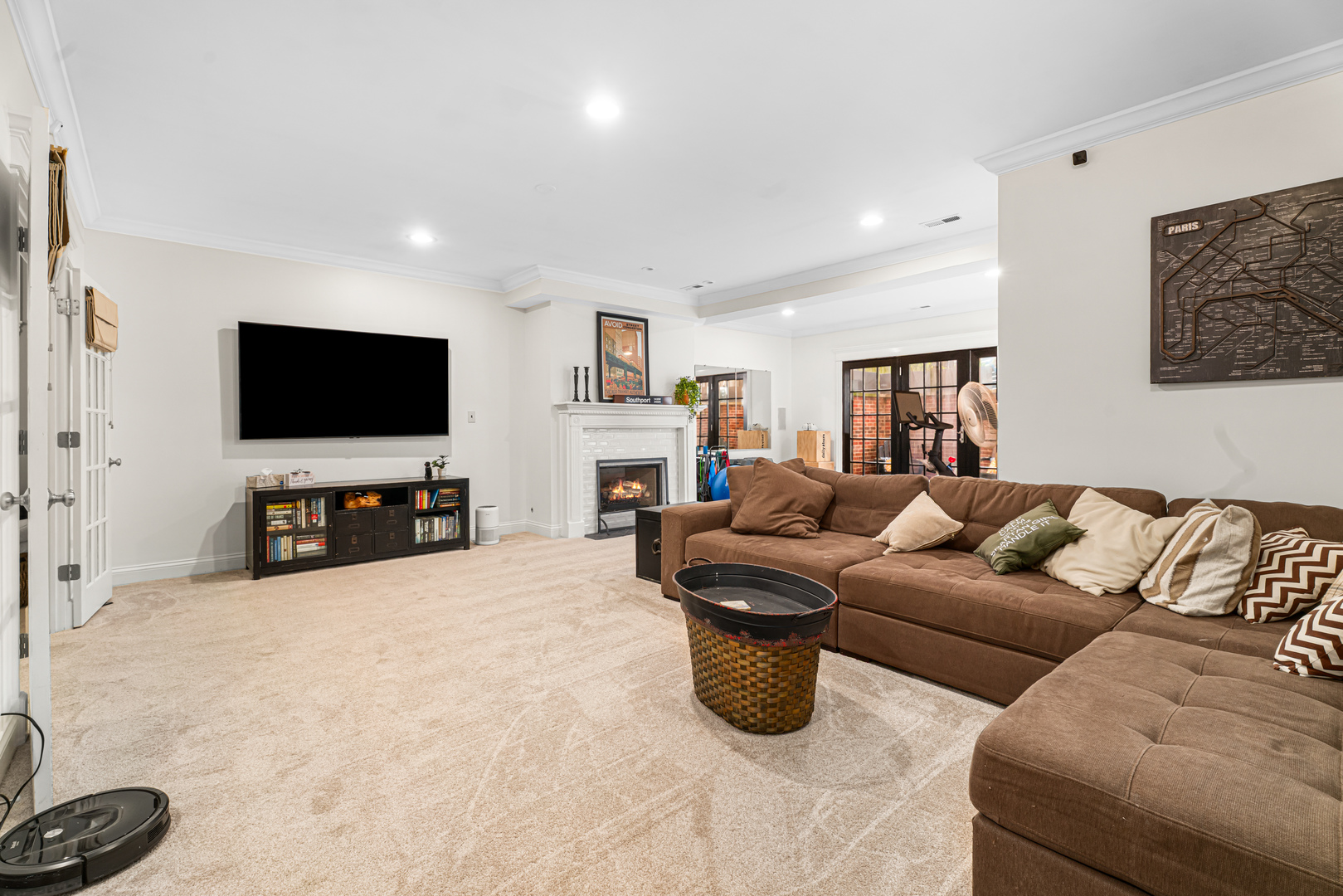 Undisclosed Address Chicago, IL 60613 - Photo 39 of 68 a living room with furniture and a flat screen tv