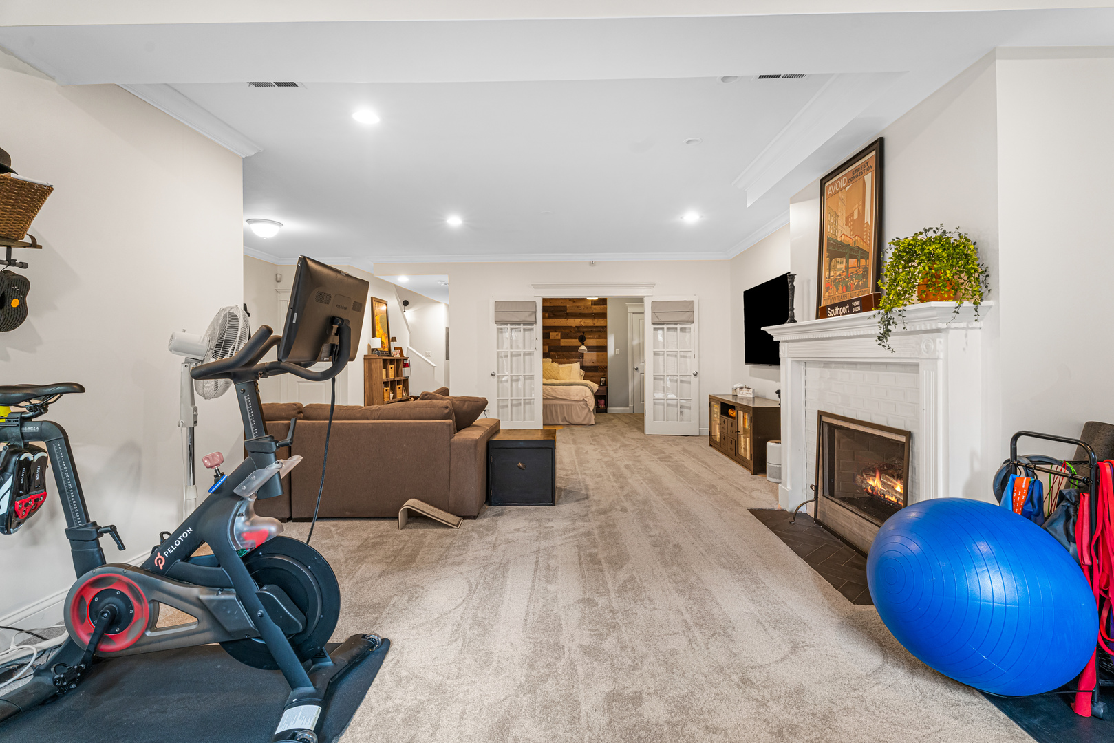 Undisclosed Address Chicago, IL 60613 - Photo 45 of 68 a view of a livingroom with furniture and a fireplace