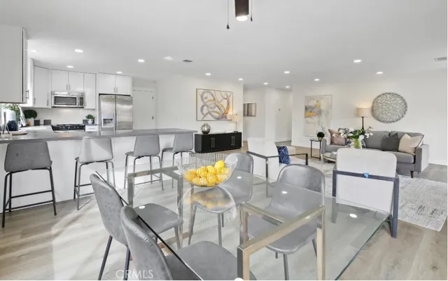 a view of kitchen with dining table and chairs