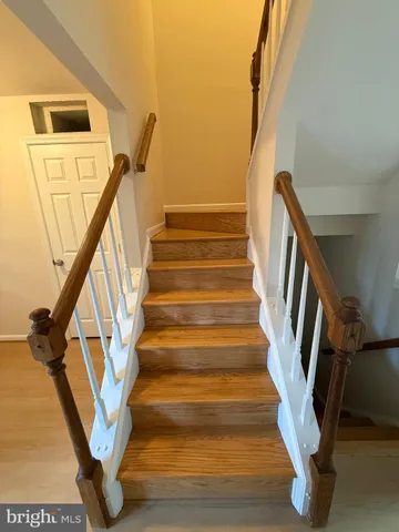 a view of entryway with wooden floor