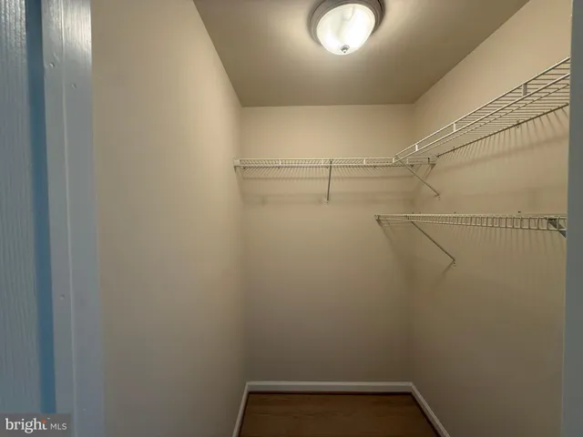 a view of a room with racks on the wall