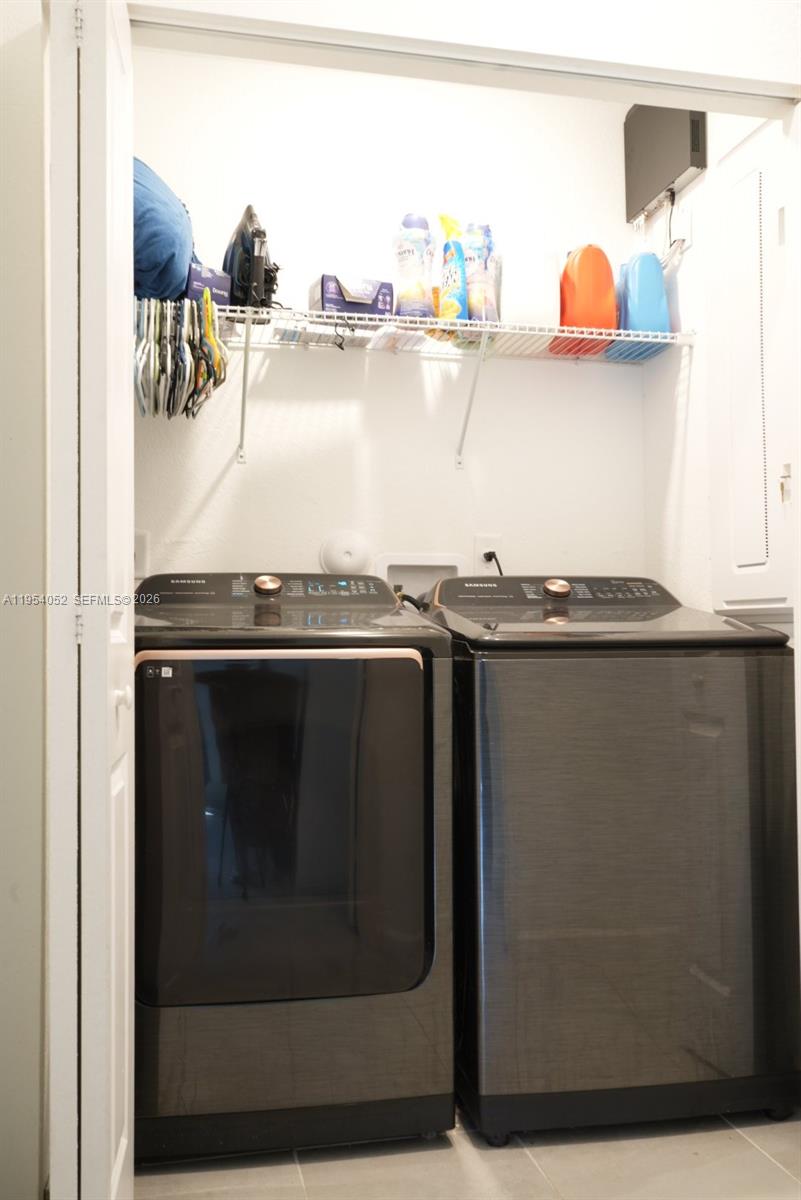 13321 Southwest 284th Street Homestead, FL 33033 - Photo 26 of 30 a close view of sink and stove