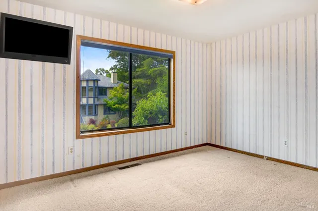 a view of a livingroom with a flat screen tv