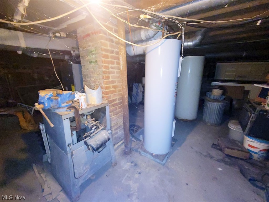 6738 Pymatuning Lake Road Andover, OH 44003 - Photo 15 of 17 Utility room with electric water heater