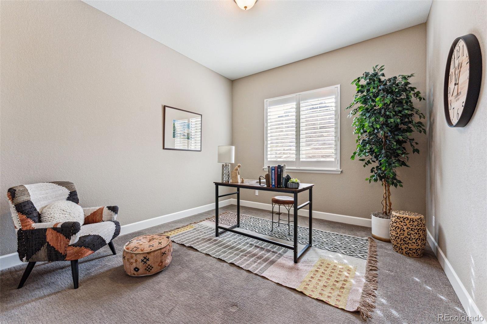 4937 Hogback Ridge Road Morrison, CO 80465 - Photo 16 of 43 a livingroom with furniture and a window