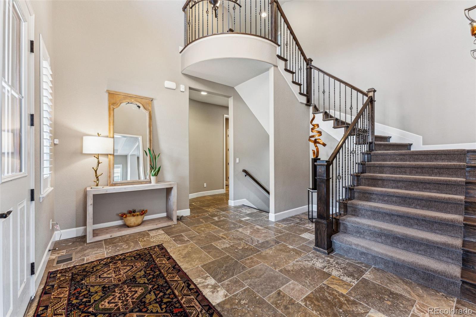 4937 Hogback Ridge Road Morrison, CO 80465 - Photo 3 of 43 a view of entryway and hall