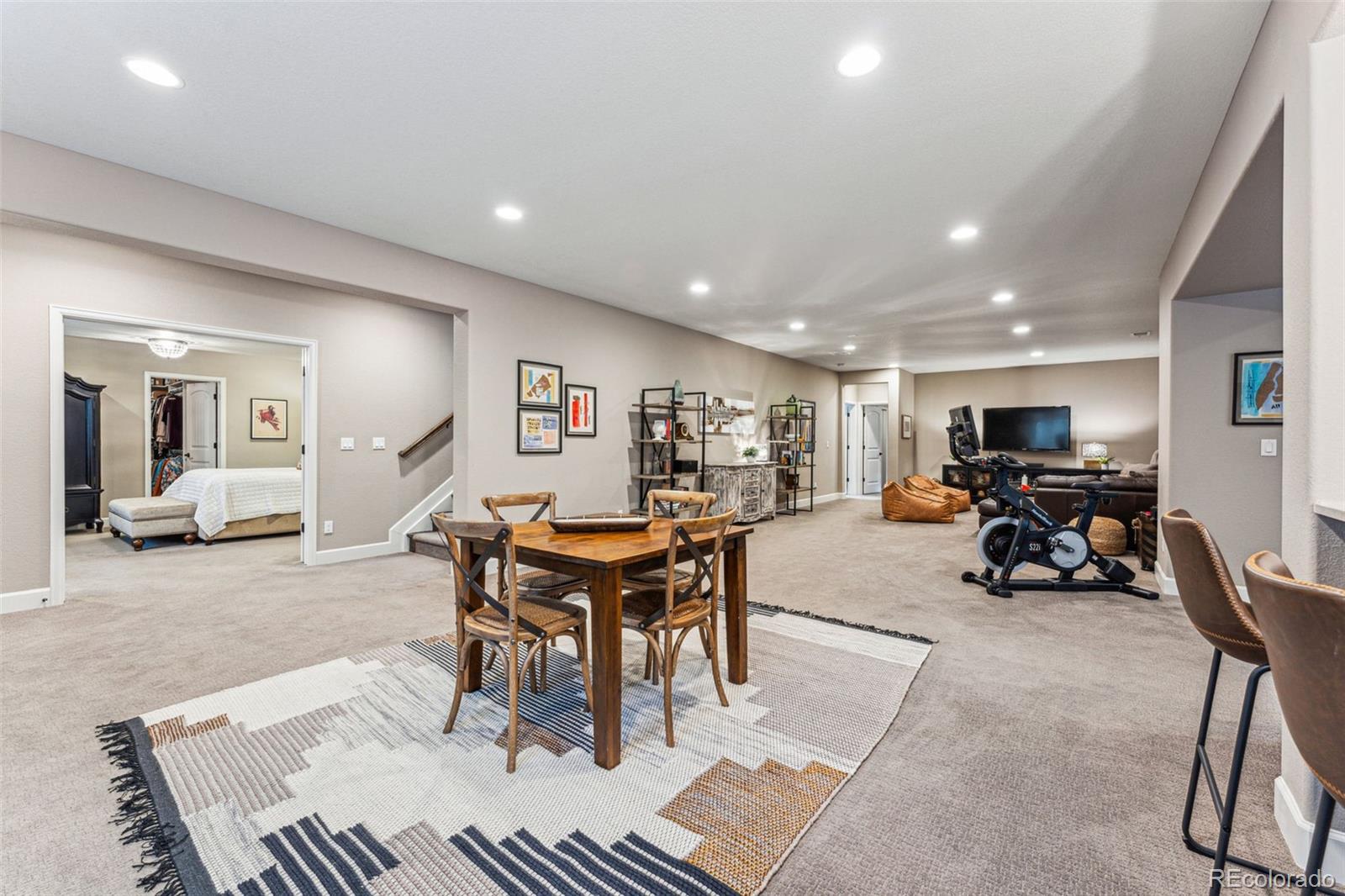 4937 Hogback Ridge Road Morrison, CO 80465 - Photo 31 of 43 a view of a dining room with furniture and a livingroom