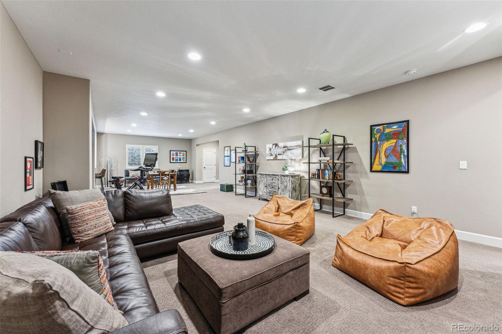 4937 Hogback Ridge Road Morrison, CO 80465 - Photo 36 of 43 a living room with furniture and a wooden floor
