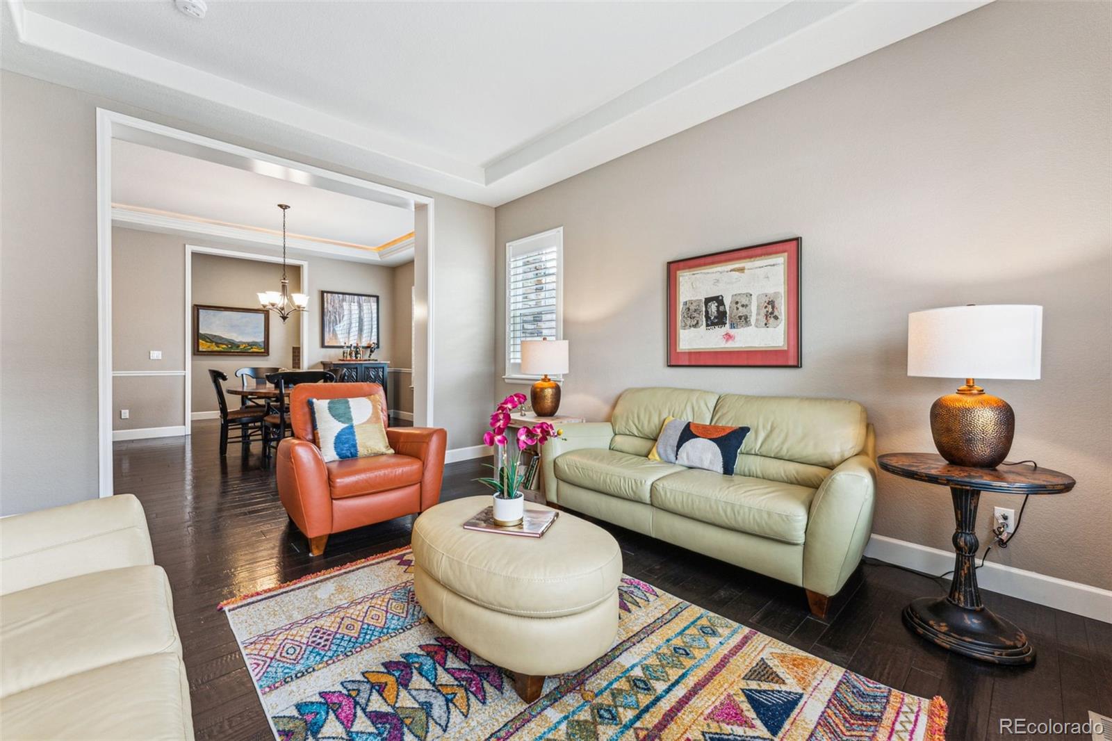 4937 Hogback Ridge Road Morrison, CO 80465 - Photo 4 of 43 a living room with furniture and a rug