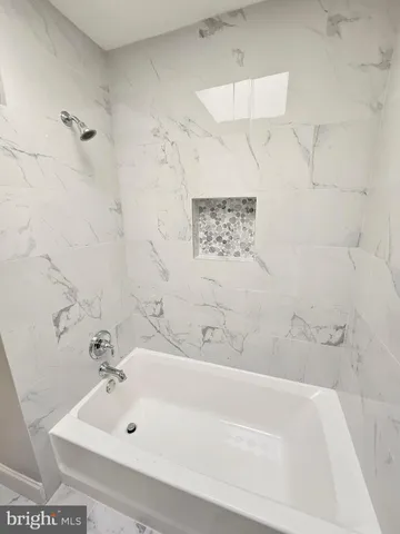 a bathroom with a bathtub