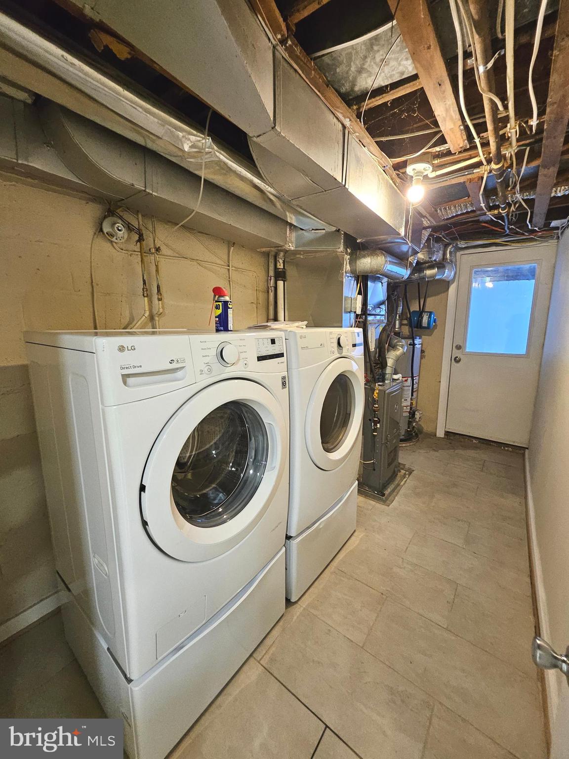 4546 Mountview Road Baltimore, MD 21229 - Photo 39 of 45 a utility room with dryer and washer