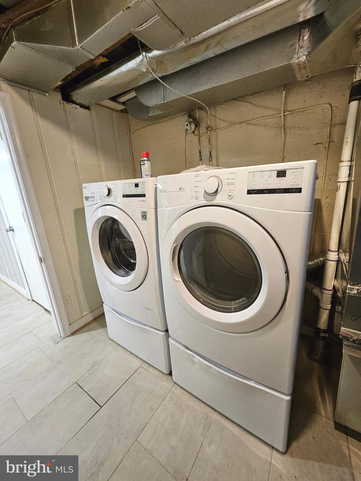 4546 Mountview Road Baltimore, MD 21229 - Photo 40 of 45 a utility room with dryer and washer
