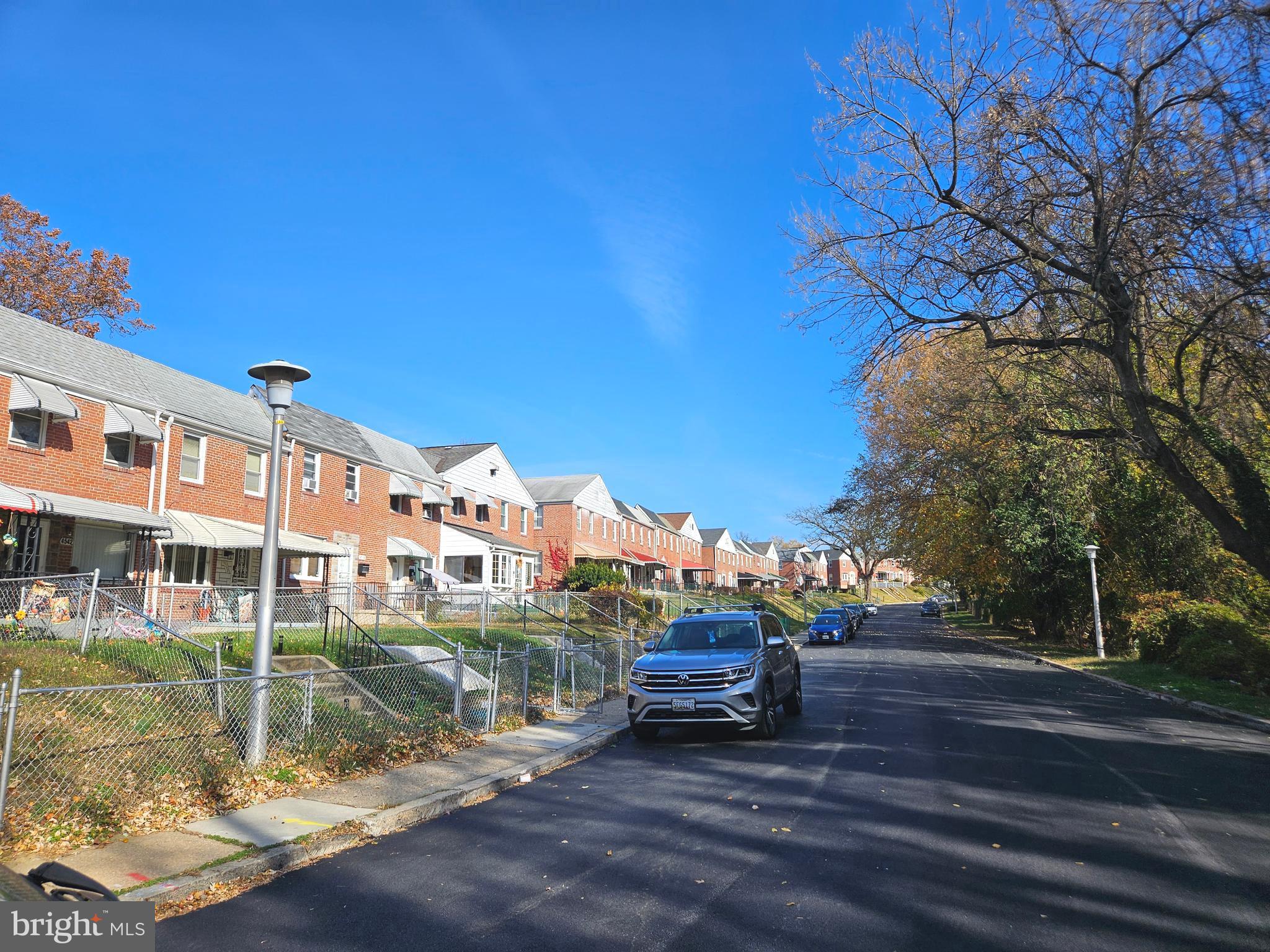 4546 Mountview Road Baltimore, MD 21229 - Photo 44 of 45 a view of house with a yard