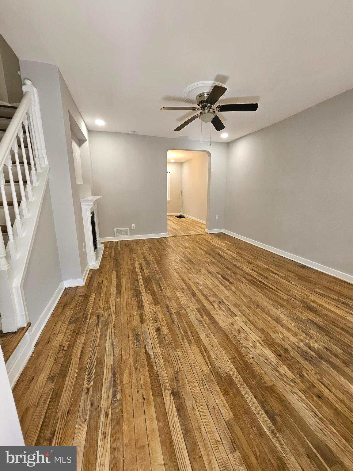 4546 Mountview Road Baltimore, MD 21229 - Photo 5 of 45 a view of empty room with wooden floor