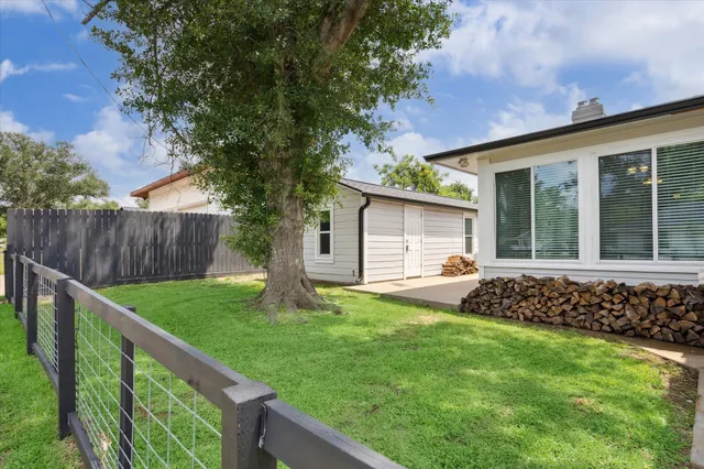 a view of a house with a garden