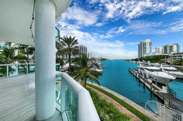 a view of swimming pool from a balcony