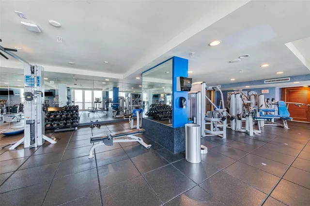 a view of multiple houses with a yard