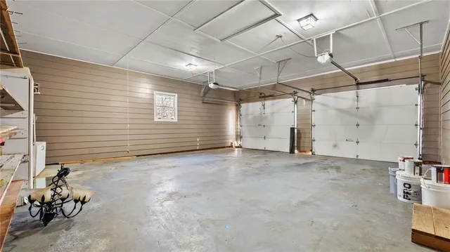 a house that has a tree in front of it