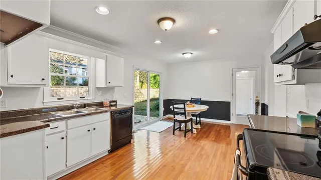 a view of kitchen with breakfast area