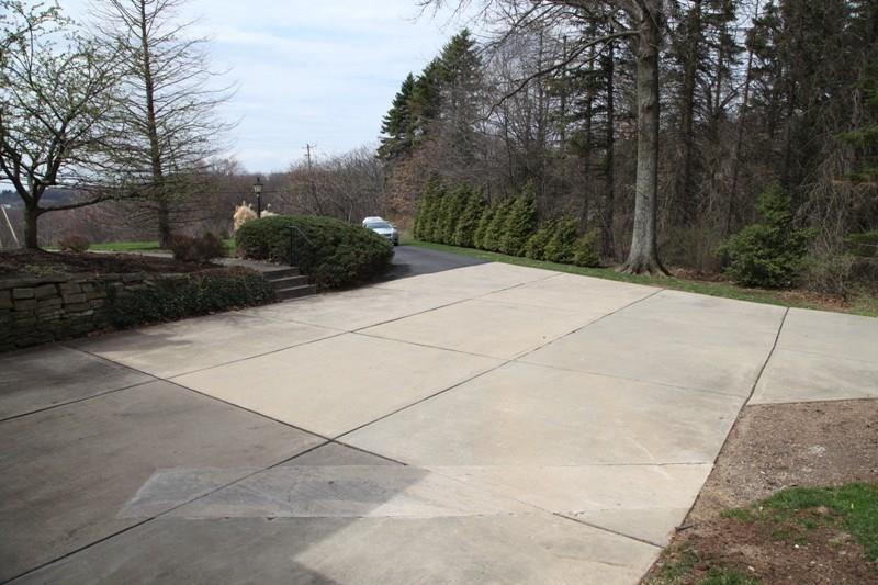 2356 Nicholson Road Franklin Park, PA 15143 - Photo 18 of 24 Lots of Cement Driveway... That's a full size car in the image.
