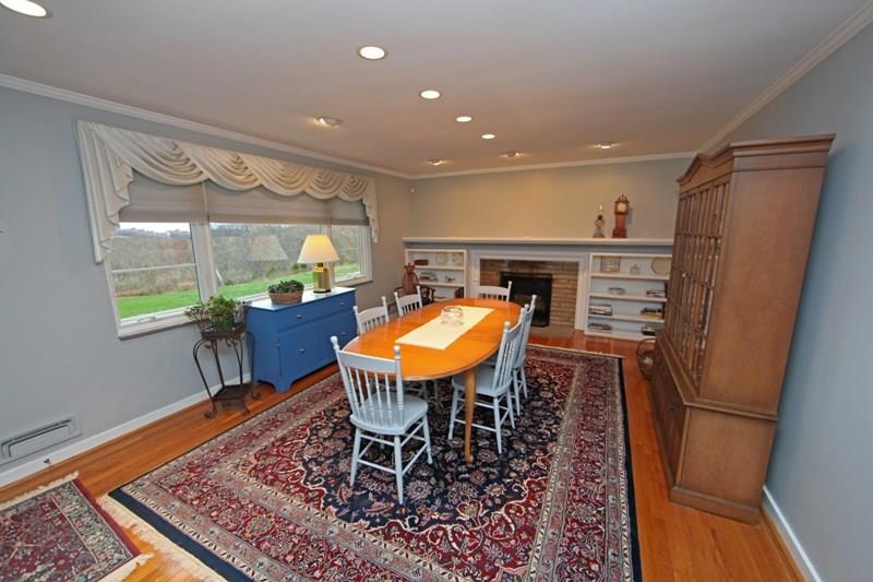 2356 Nicholson Road Franklin Park, PA 15143 - Photo 6 of 24 Entertain Family & Friends in this Large Room.... Replete with Crown Molding & a Log Burning Fireplace.