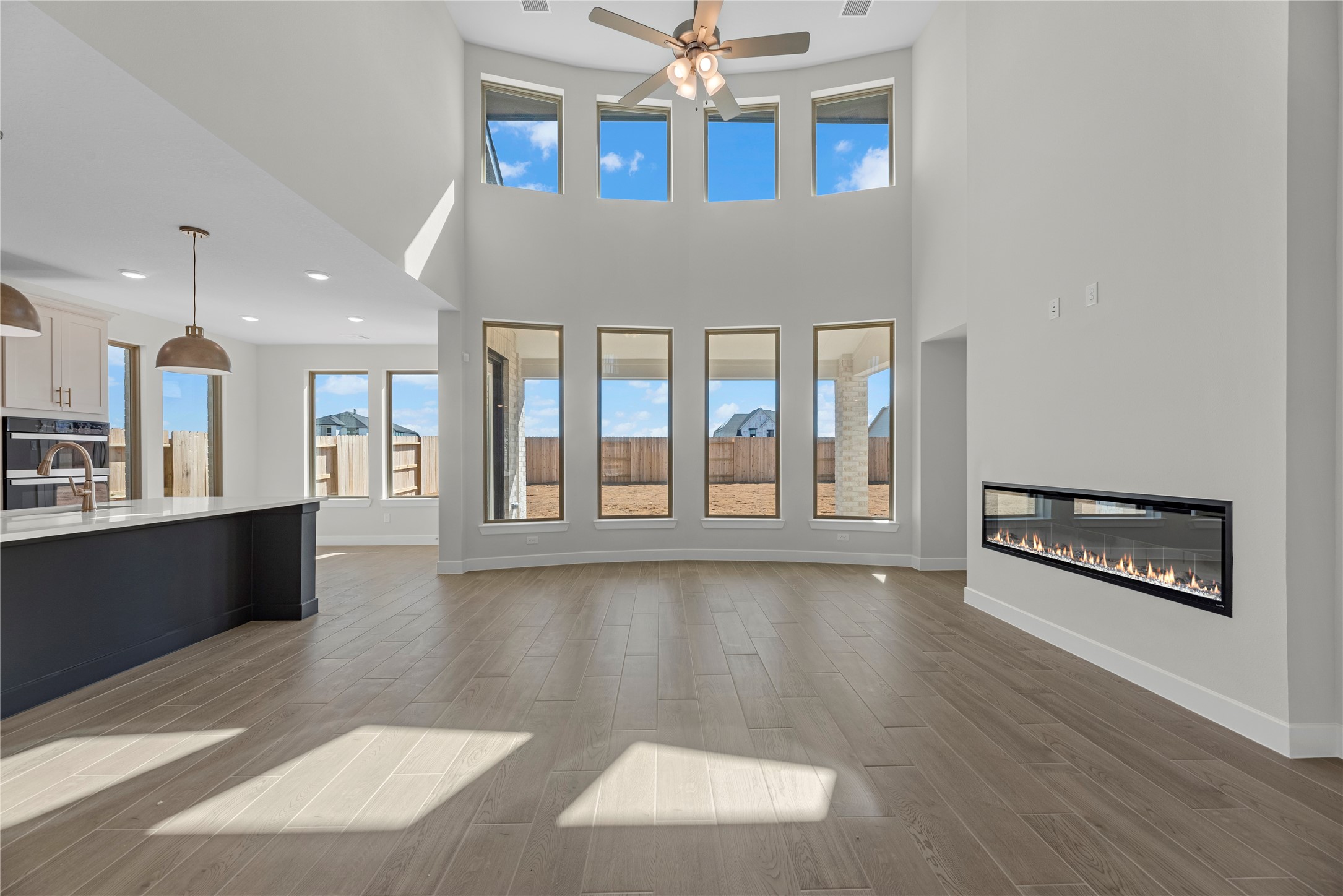 5023 Nesbit Path Rosenberg, TX 77471 - Photo 3 of 25 a view of an empty room with window and wooden floor