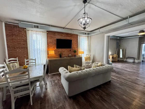 a bathroom with a sink toilet and mirror