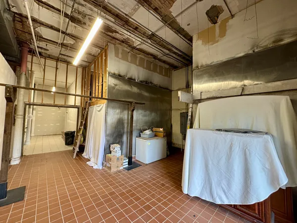 a view of an empty room and window