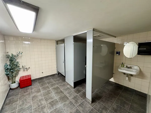 a building exterior with furniture