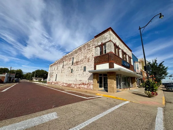 a front view of a building with street