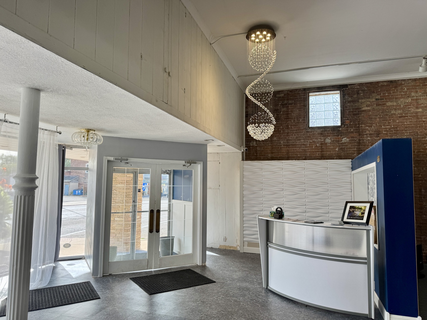 902 North Main Street Princeton, IL 61356 - Photo 4 of 33 a view of a refrigerator in kitchen and wooden floor