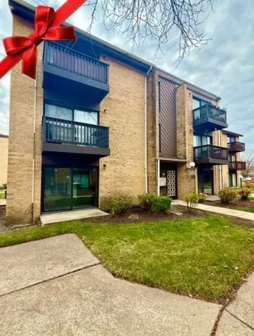 a view of a house with a garden