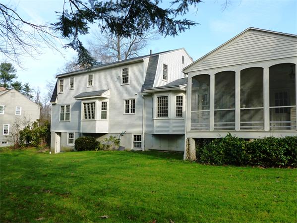 20 West Colonial Road Wilbraham, MA 01095 - Photo 2 of 18 a view of a house with a backyard