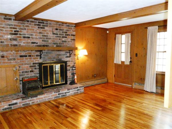 20 West Colonial Road Wilbraham, MA 01095 - Photo 3 of 18 a view of an empty room with a fireplace