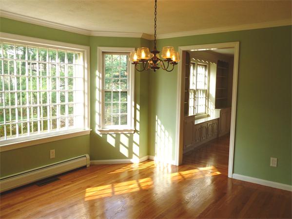 20 West Colonial Road Wilbraham, MA 01095 - Photo 7 of 18 a view of an empty room with a window and wooden floor