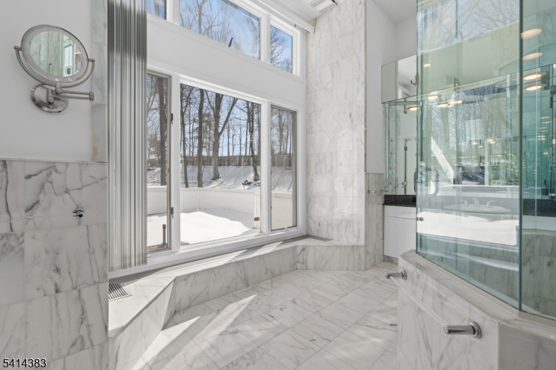 2 Old Mill Road North Caldwell, NJ 07006 - Photo 13 of 25 a bathroom with a bathtub and a shower