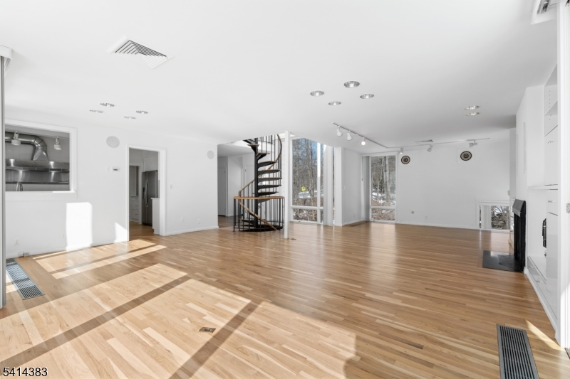 2 Old Mill Road North Caldwell, NJ 07006 - Photo 4 of 25 a view of a livingroom with furniture and an empty room