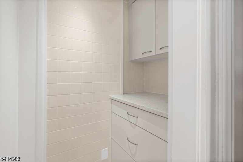 2 Old Mill Road North Caldwell, NJ 07006 - Photo 9 of 25 a bathroom with a close shower view