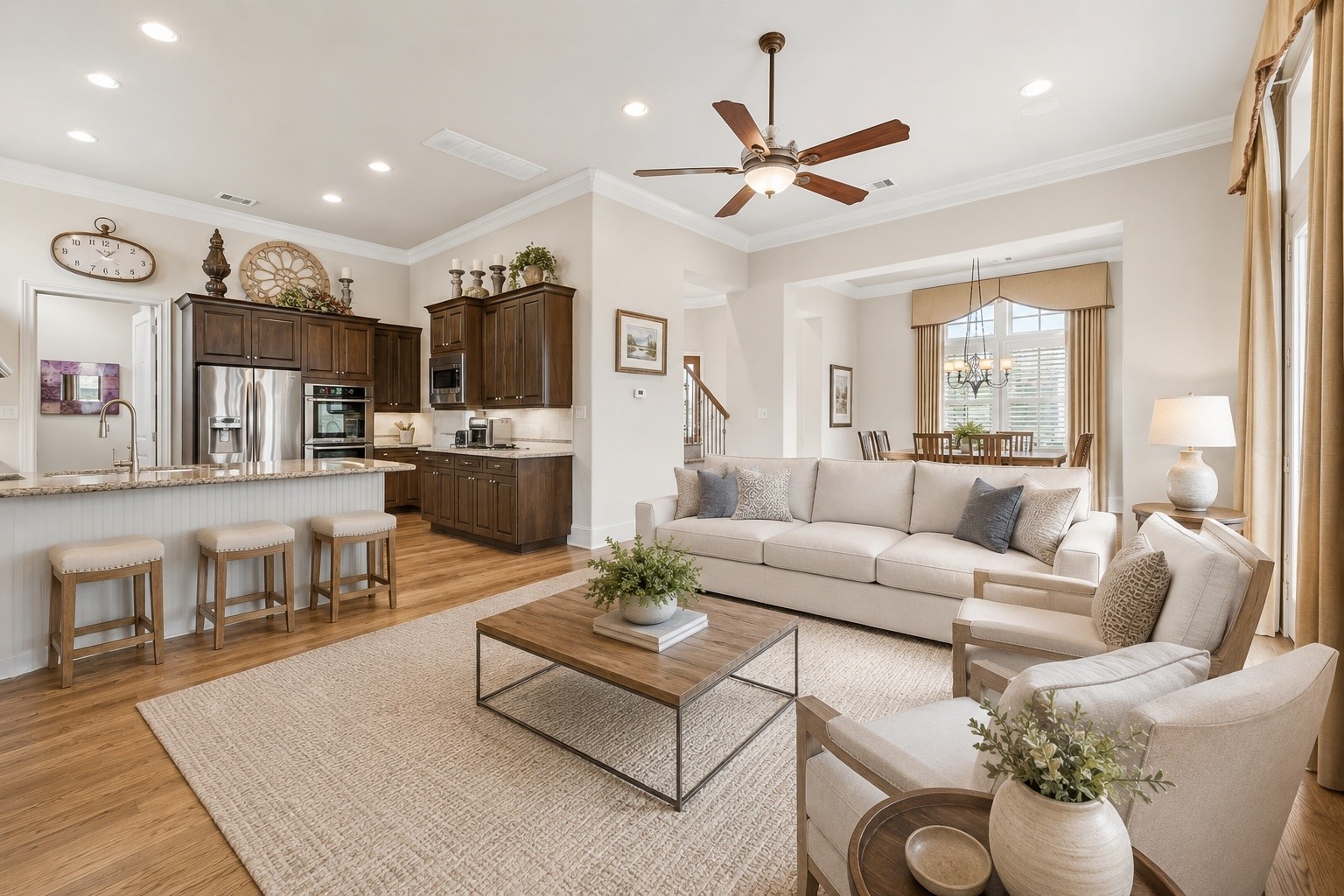 907 Queen Annes Road Houston, TX 77024 - Photo 4 of 31 Spacious central living area open to the kitchen and back patio, offering an ideal flow for entertaining and everyday living. This image has been virtually staged for illustrative purposes.