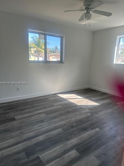 2220 Southwest 67th Way Miramar, FL 33023 - Photo 3 of 13 wooden floor in an empty room with a window