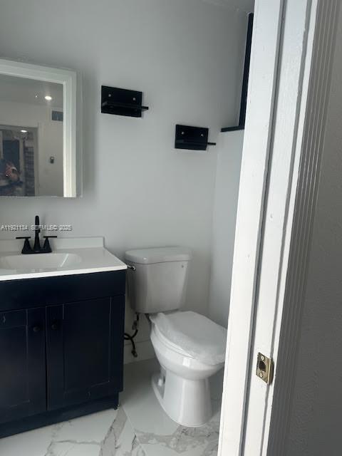 2220 Southwest 67th Way Miramar, FL 33023 - Photo 7 of 13 a bathroom with a sink and a mirror