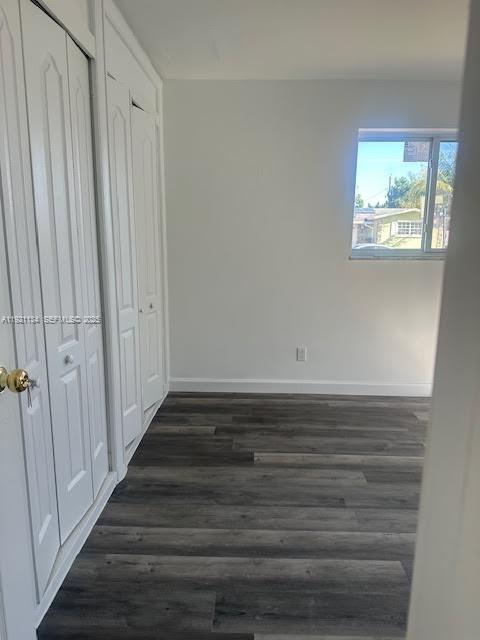2220 Southwest 67th Way Miramar, FL 33023 - Photo 9 of 13 a view of a room with wooden floor and window