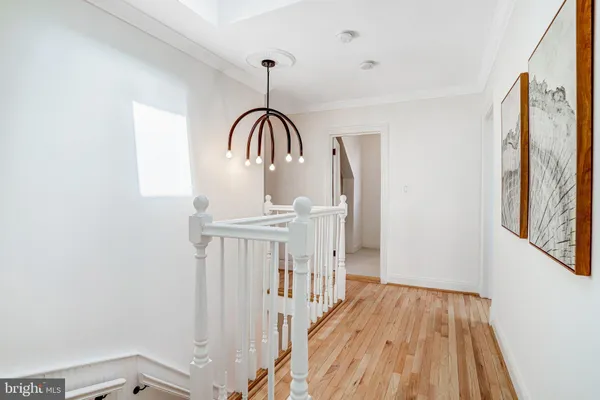 a bedroom with bed and a window
