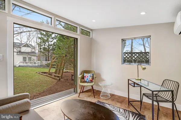 a living room with a couch and a table