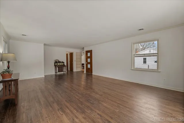 a view of a livingroom with wooden floor
