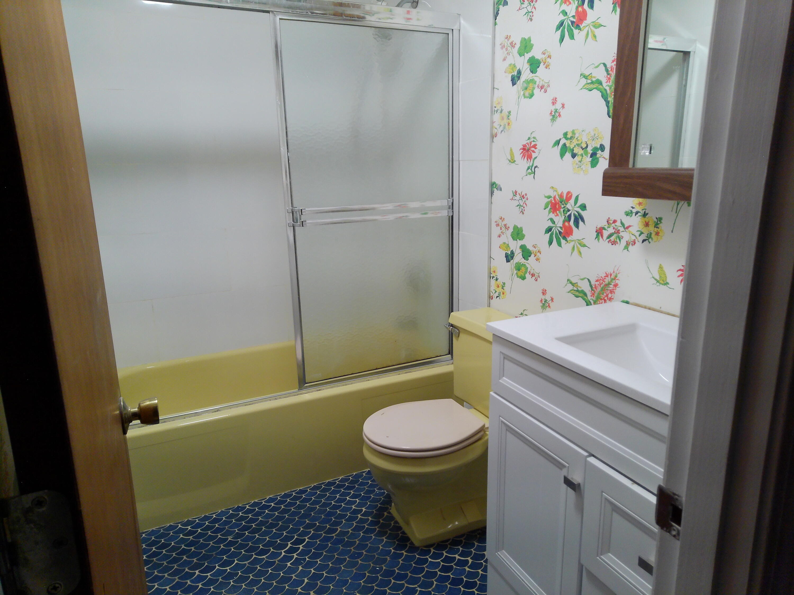 300 Buck Island Road, Unit 21B West Yarmouth, MA 02673 - Photo 14 of 14 a bathroom with a sink toilet and shower