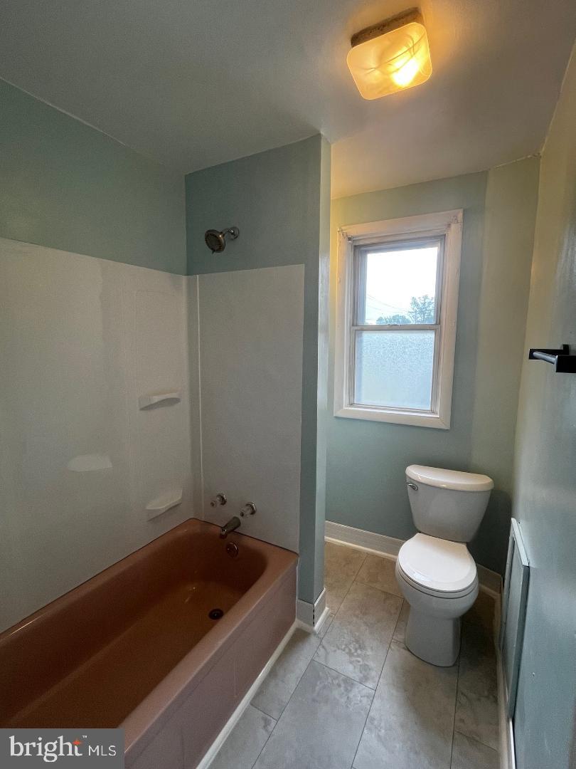 904-906 Main Avenue Croydon, PA 19021 - Photo 33 of 51 a bathroom with a toilet a sink and bathtub