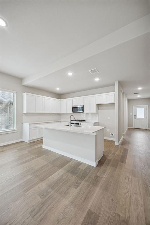 2109 Sunshining Road Princeton, TX 75407 - Photo 11 of 35 Kitchen in the Stanley II home plan by Trophy Signature Homes – REPRESENTATIVE PHOTO