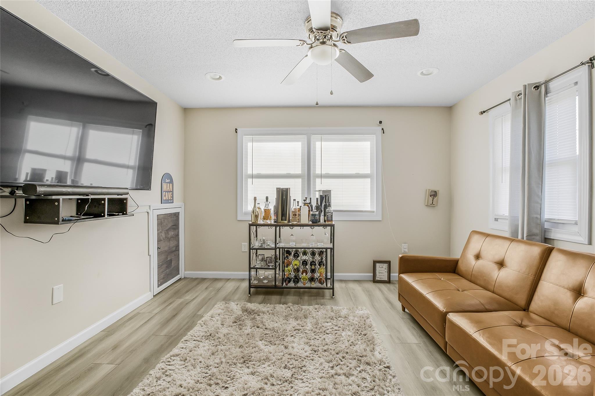 463 Winfree Road Wadesboro, NC 28170 - Photo 16 of 19 a living room with furniture and a window